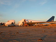 While later versions are still in production, earlier variants have been retired.  This Continental Airlines 747-200 at the Mojave Airport, has been cut up for scrap.