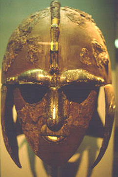 Sutton Hoo parade helmet (British Museum, restored). Although based on late Roman helmets of spangenhelm type, the immediate comparisons are with contemporary Vendel Age helmets from eastern Sweden.