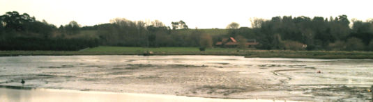 Sutton Hoo from the Deben tideway (Mound 2 visible on the horizon above the farm).