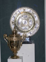 The Ladies' (top) and Gentlemen's singles trophies.