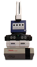 The Wii (top) compared in size to the GCN, N64, North American SNES and NES