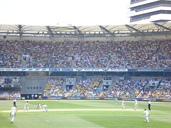 Warne (right) bowling to Ian Bell at Brisbane Cricket Ground in 2006