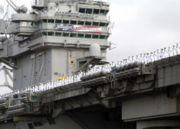 The USS Abraham Lincoln returning to port carrying its Mission Accomplished banner