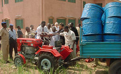 A lawn tractor towing a cargo cart