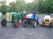 In the middle is a 24 hp (18 kW) diesel CUT illustrating the size difference between a small farm tractor and a garden tractor