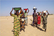 Women in Mao, where water is provided by a water tower. Access to clean water is often a problem in Chad.