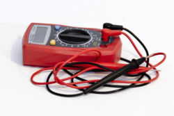 A multimeter can be used to measure the voltage between two points