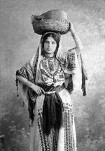 Arab woman from Ramallah wearing traditional dress in 1915.