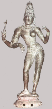 An 11th century Chola Dynasty bronze figurine of Arthanariswara.