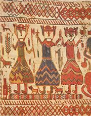 This part of the Skog Church Tapestry, a Viking Age Swedish tapestry, is interpreted to show, from left to right, the one-eyed and tree flanked Odin, the hammer-wielding Thor and Freyr holding up an ear of corn.
