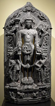 A statue of Vishnu with Lakshmi (left) and Saraswati in Stanford Museum