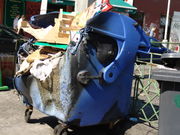 Charred trash can in Prague