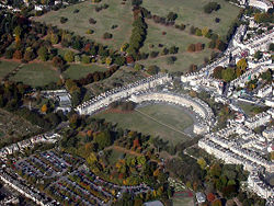 The Royal Crescent from the air: Georgian taste favoured the civilised regularity of Bath's streets and squares and the delightful contrast with rural nature immediately at hand.