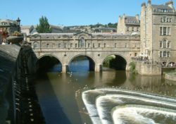 The Palladian-style Pulteney Bridge and the weir at Bath