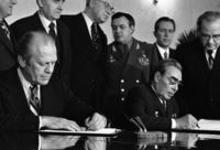 Leonid Brezhnev and Gerald Ford are signing joint communiqué on the SALT treaty in Vladivostok