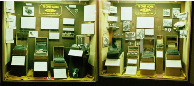 A selection of seven Enigma machines and paraphernalia exhibited at the USA's National Cryptologic Museum. From left to right, the models are: 1) Commercial Enigma; 2) Enigma T; 3) Enigma G; 4) Unidentified; 5) Luftwaffe (Air Force) Enigma; 6) Heer (Army) Enigma; 7) Kriegsmarine (Naval) Enigma—M4.