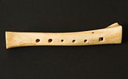 Early flutes were made of carved bone.