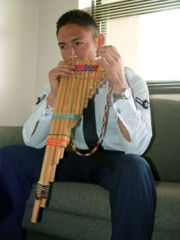 Playing the zampoña, a Pre-Inca instrument and type of pan pipes.