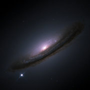 SN 1994D in the NGC 4526 galaxy (bright spot on the lower left). Image by NASA, ESA, The Hubble Key Project Team, and The High-Z Supernova Search Team