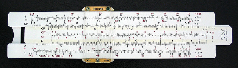 The C and D scales on this slide rule are marked off at positions corresponding to the logarithms of the numbers shown. By mechanically adding the logs of 1.3 and 2, the cursor shows the product is 2.6.
