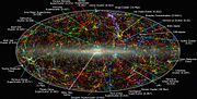 This panoramic view of the entire near-infrared sky reveals the distribution of galaxies beyond the Milky Way. The galaxies are color coded by redshift.