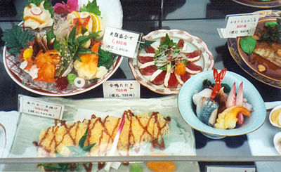 Molded plastic food replicas on display outside a restaurant in Japan.