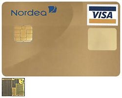 A credit card with smart card capabilities. The 3 by 5 mm chip embedded in the card is shown enlarged in the insert. Smart cards attempt to combine portability with the power to compute modern cryptographic algorithms.