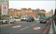 At Old Street, street markings and a sign (inset) with the white-on-red C alert drivers to the charge.