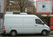 Closed-circuit cameras and vans police the zone, capturing live video. Vans can be identified by a sticker on the back door (inset).