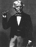 Michael Faraday holding a glass bar of the type he used in 1845 to show that magnetism can affect light. Detail of an engraving by Henry Adlard, based on an earlier photograph by Maull & Polyblank ca. 1857. 