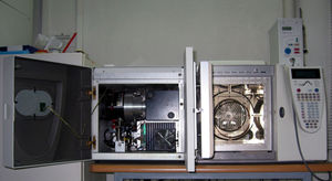 A gas chromatograph (right) directly coupled to a mass spectrometer (left)
