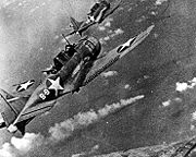 American aircraft attacking a Japanese cruiser at Midway