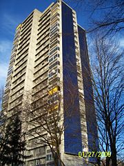 residential building with solar panels on one side (Bern, Switzerland).