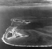 Midway Atoll, several months before the battle. Eastern Island (with the airfield) is in the foreground, and the larger Sand Island is in the background to the west.