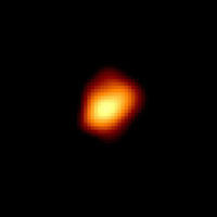 The asymmetrical appearance of Mira, an oscillating variable star. NASA HST image
