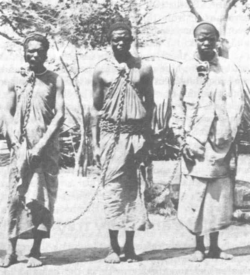 Three Abyssinian slaves in chains