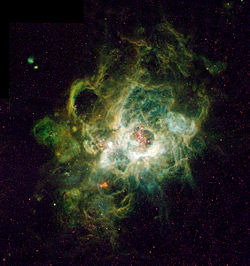 NGC 604 in the Triangulum Galaxy is a very massive open cluster surrounded by an H II region.