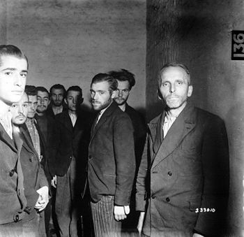 German Gestapo agents arrested after the fall of Liège, Belgium, are herded together in a cell in the citadel of Liège