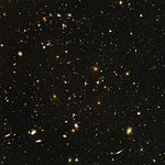 The Hubble Ultra Deep Field further corroborates this. The smallest, reddest galaxies, about 100, are some of the most distant to have been imaged in an optical telescope.