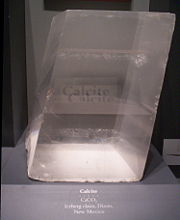 Doubly refracting Calcite from Iceberg claim, Dixon, New Mexico. This 35 pound (16 kg) crystal, on display at the National Museum of Natural History, is one of the largest single crystals in the United States.