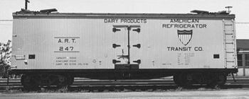 A World War II-era wood-sided, ice bunker "reefer" of the American Refrigerator Transit Company (ART), one specially-designated for the transport of dairy products, circa 1940.