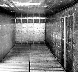 The interior of a typical ice-bunker reefer from the 1920s; the wood sheathing would give way to plywood within twenty years. Vents in the bunker at the end of the car, along with slots in the wood floor racks, allowed cool air to circulate around the contents during transit.