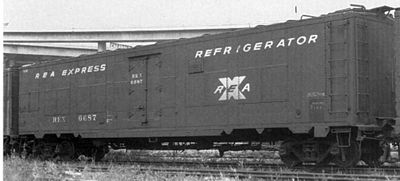 Railway Express Agency refrigerator car #6687, a converted World War II "troop sleeper." Note the square panels along the sides that cover the window openings.