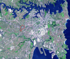 NASA image of Sydney's CBD and surrounds, with borders of Summer Hill shown in red.