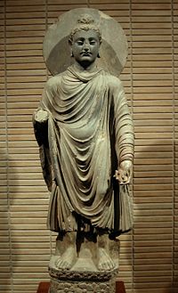 A Greco-Buddhist statue, one of the first representations of the Buddha, 1st-2nd century CE, Gandhara.