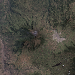 the Galeras Volcano', Aerial image by NASA showing activity. City of Pasto on the right.