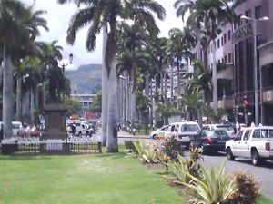 Port Louis' banking district, and the main avenue leading to the Government House (seen in the background).