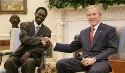 Minni Minnawi was granted a press opportunity with U.S. President George W. Bush after signing the May agreement.