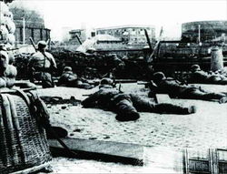 Defenders in position on the roof of the warehouse