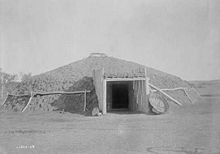 Mandan lodge, circa 1908. Photographed by Edward S. Curtis.